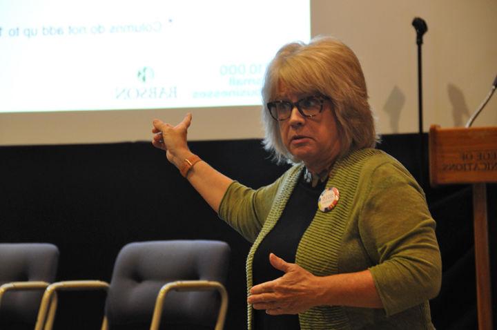 Dr. Patricia Greene addresses a group of faculty